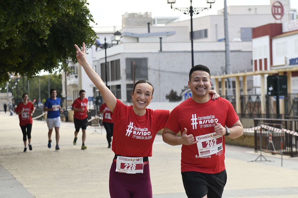 La XIII carrera solidaria Corriendo con Assido, en imágenes