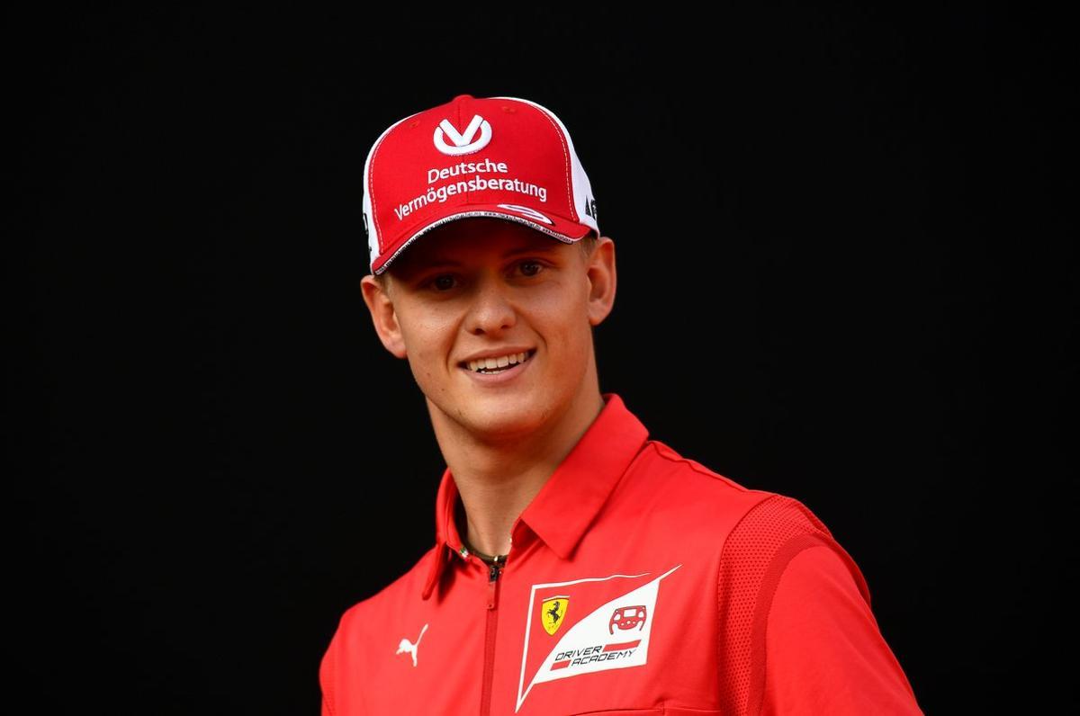 FILE PHOTO: Racing driver Mick Schumacher attends an event to celebrate 90 years of Italian premium sports car maker Ferrari racing team at Milan’s Duomo square, in Milan, Italy September 4, 2019. REUTERS/Flavio lo Scalzo/File Photo