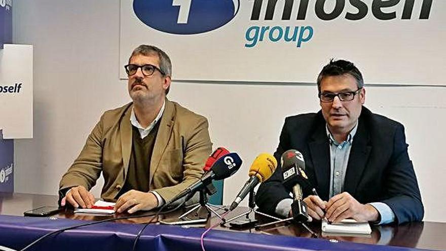 Cesc Riera i Xavi Fernández, ahir en la roda de premsa a les oficines que Infoself ha cedit a l&#039;Uni Girona.