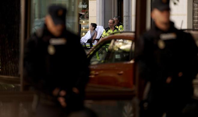 El desahucio de Maricarmen en el centro de Madrid, en imágenes