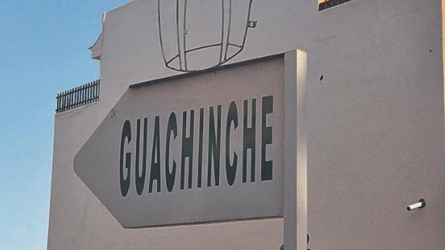 Cartel con el término guachinche.