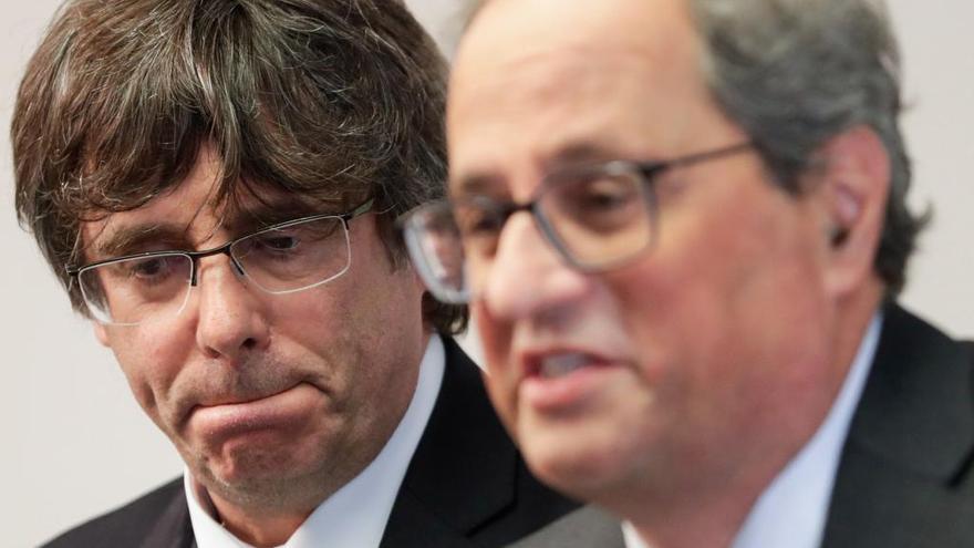 Carles Puigdemont junto a Quim Torra.