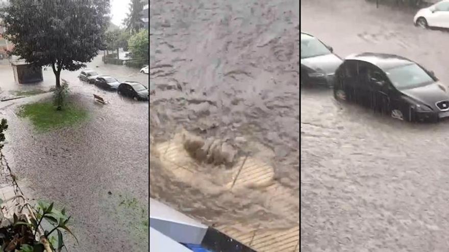 La tormenta inunda el entorno del Palacio de los Deportes de Oviedo: el agua anega los garajes, derriba varias motos y se lleva flotando los cubos de basura