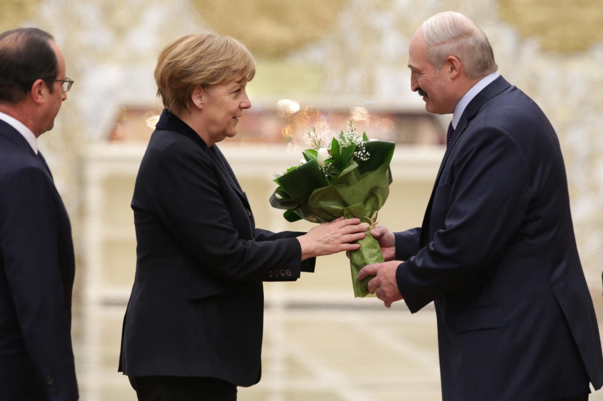 Angela Merkel y Alexandr Lukashenko.