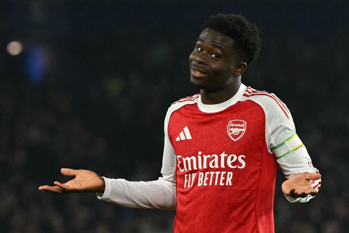 TOPSHOT - Arsenal's English midfielder #07 Bukayo Saka celebrates after scoring the opening goal of the English Premier League football match between Brighton and Hove Albion and Arsenal at the American Express Community Stadium in Brighton, southern England on March 4, 2026. (Photo by Glyn KIRK / AFP) / RESTRICTED TO EDITORIAL USE. No use with unauthorized audio, video, data, fixture lists, club/league logos or 'live' services. Online in-match use limited to 120 images. An additional 40 images may be used in extra time. No video emulation. Social media in-match use limited to 120 images. An additional 40 images may be used in extra time. No use in betting publications, games or single club/league/player publications. /. SEE CAPTION FOR MORE INFORMATION / RESTRICTED TO EDITORIAL USE. No use with unauthorized audio, video, data, fixture lists, club/league logos or 'live' services. Online in-match use limited to 120 images. An additional 40 images may be used in extra time
