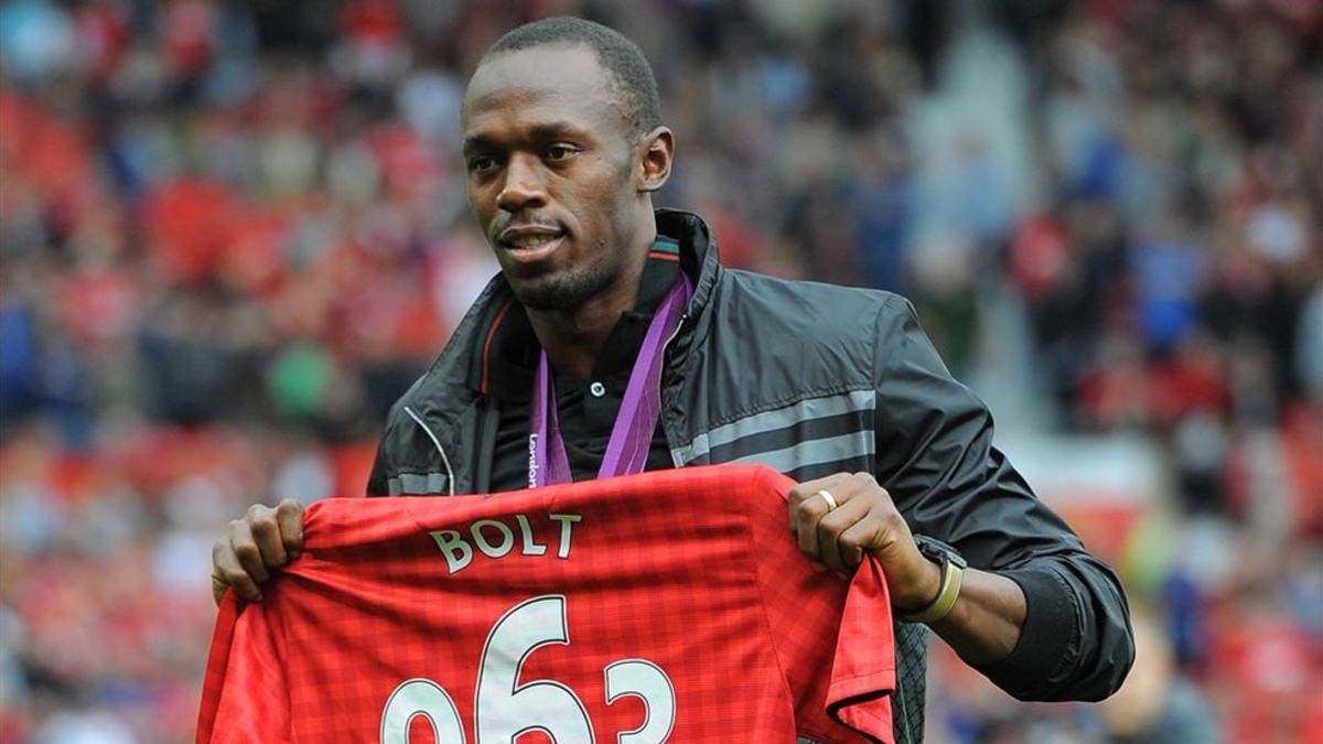 Bolt, en una fotografía del 2012, con la camiseta del Manchester