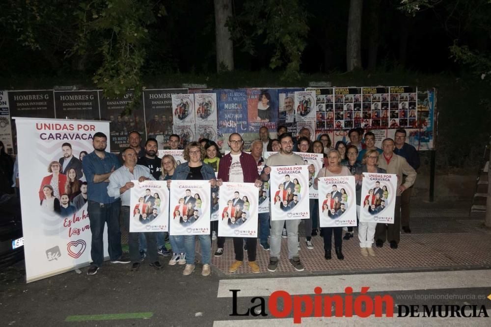 Pegada de carteles en Caravaca