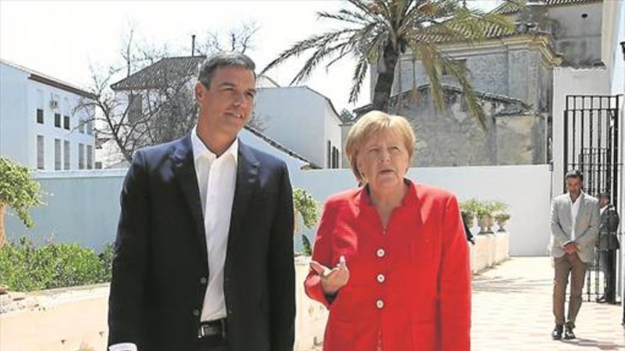 Sánchez y Merkel pactan ayuda urgente para Marruecos