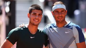 Archivo - Los tenistas españoles Carlos Alcaraz y Rafa Nadal en el Mutua Madrid Open