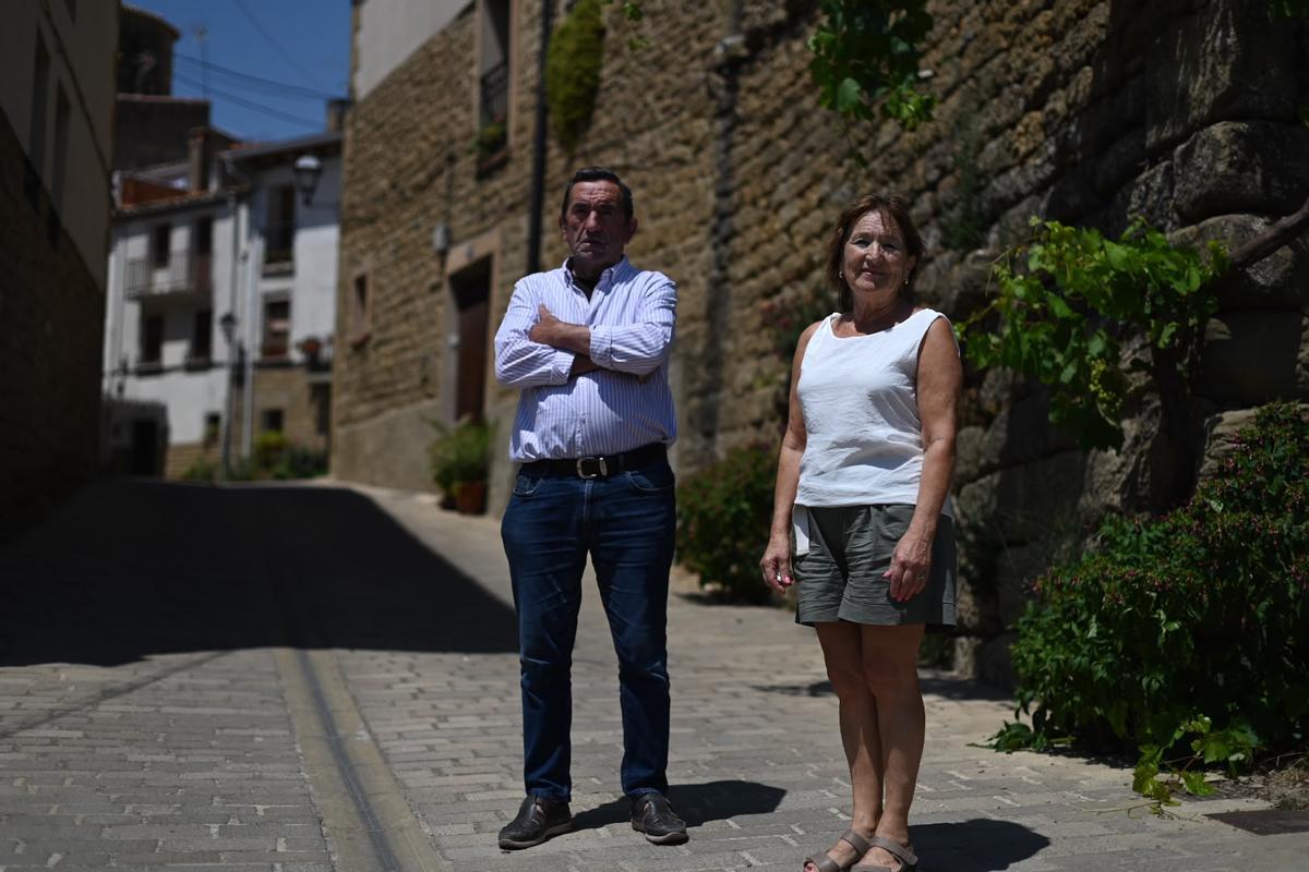 En imágenes I Los vecinos de Luesia vuelven a sus casas tras ser desalojados por el incendio de Orés