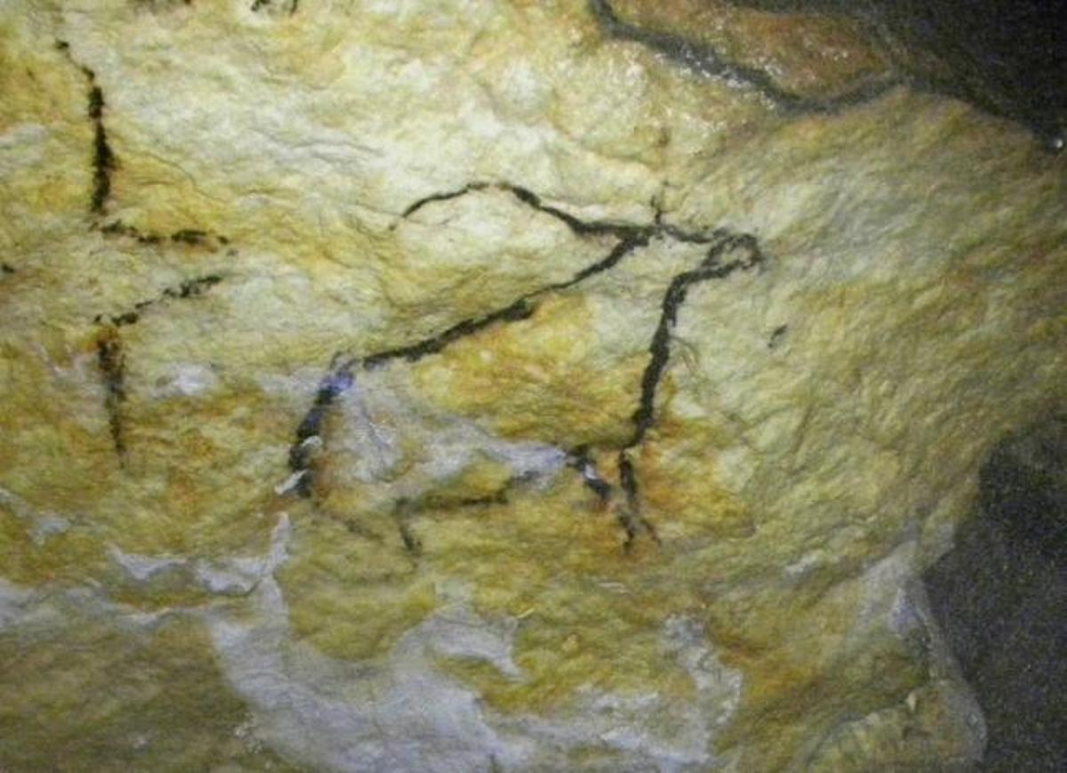 Imagen de pintura rupestre en las Cuevas de Nerja.