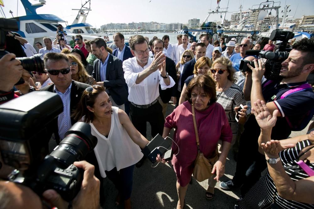 El candidato del PP a la Presidencia del Gobierno visita la Lonja del Pescado