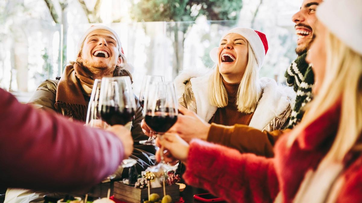 Risas en una cena navideña de empresa