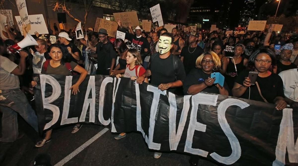 mbenach34635652 marchers numbering nearly 1 000 take to the streets to prote160709184145