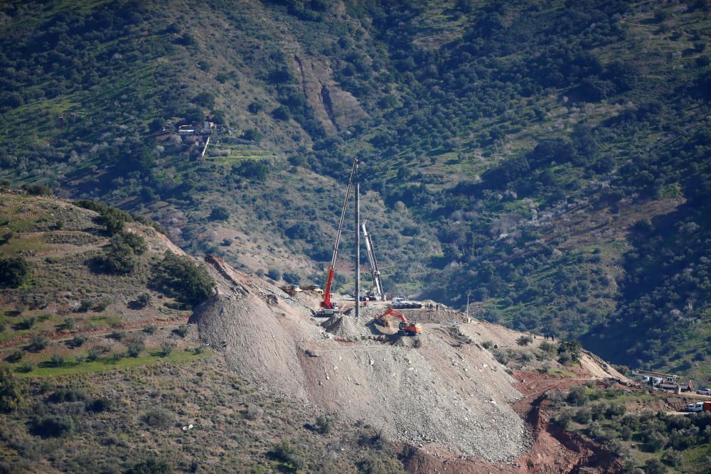 A crane removes steel tubes after failing to ...