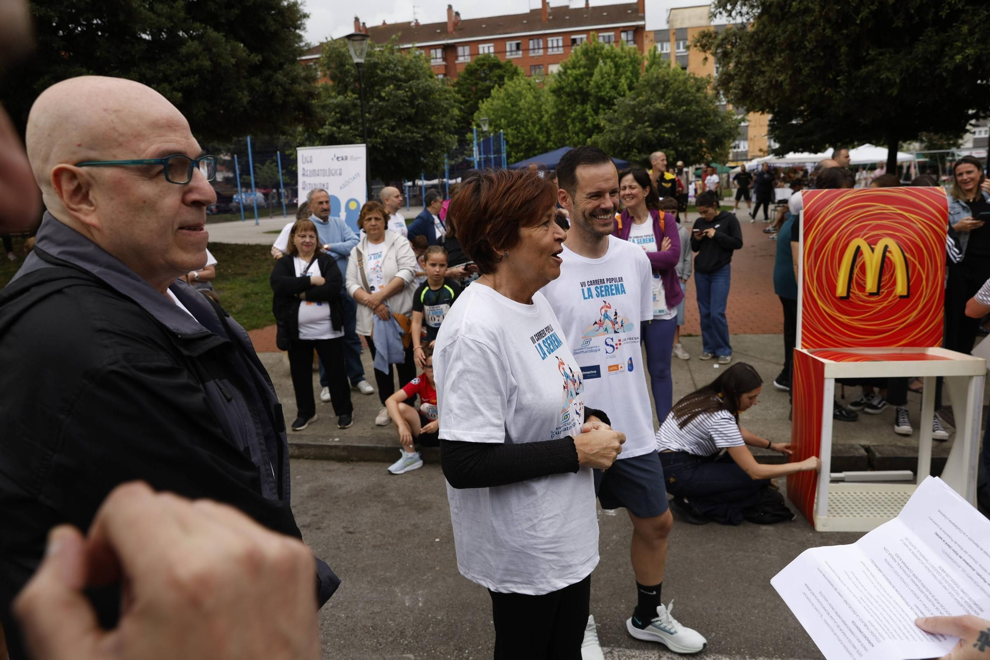 La carrera popular solidaria en El Llano, en Gijón, en imágenes