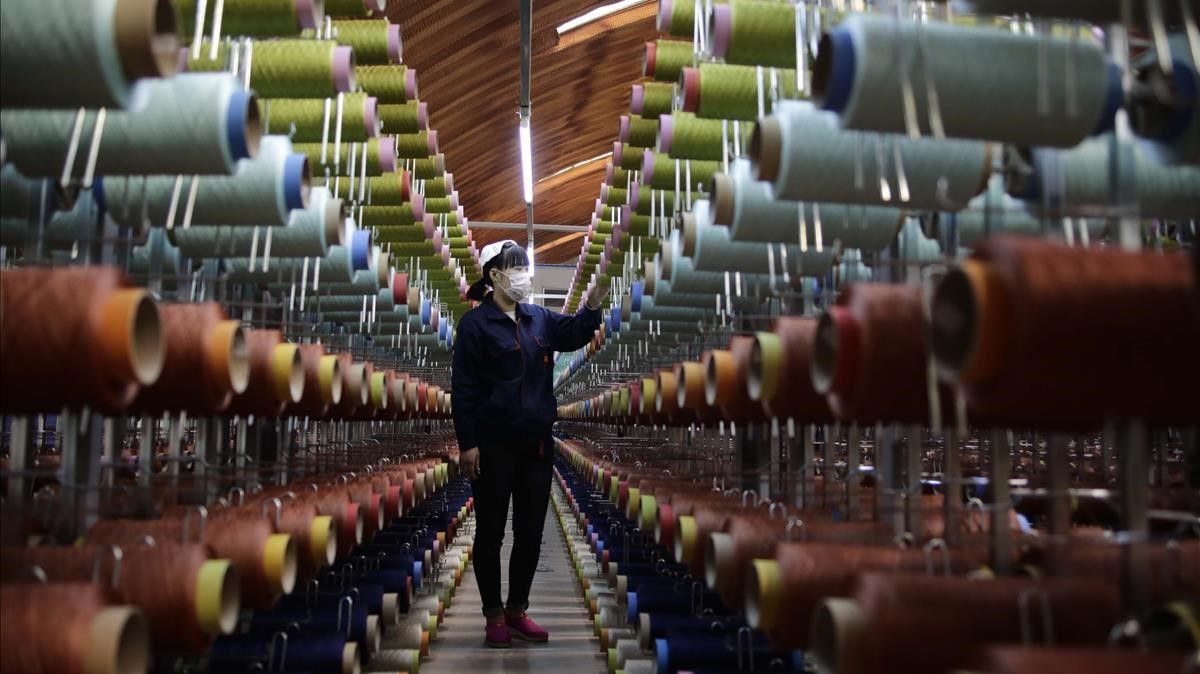 In binzhou  shandong province  China  an enterprise has created an industrial cluster dominated by recycled polyester blankets  including carpets  decorative fabrics  conveyor belts and garment fabrics  using waste plastic bottles  Chemical fiber textile materials made from waste plastic bottles (Photo credit should read YOSHINORI KAGEYAMA   Barcroft Media via Getty Images)