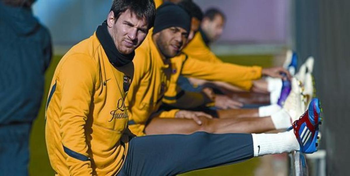 Messi i Alves,ahir, durant l’entrenament a la Ciutat Esportiva