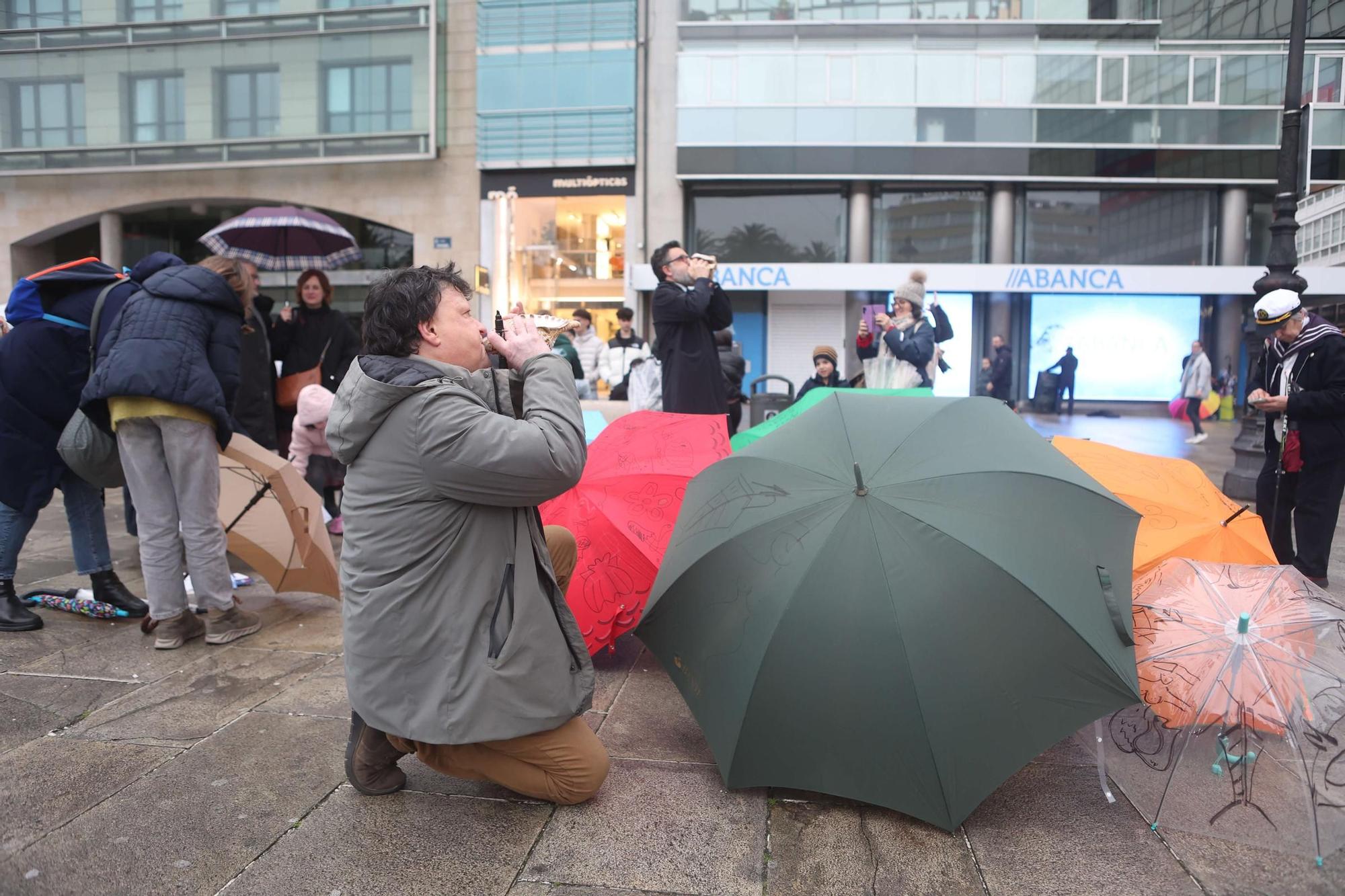 Pintada de paraguas en honor a Urbano Lugrís