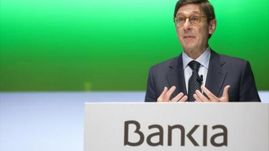 Bankia gana el 37,3% menos por la fusión con BMN