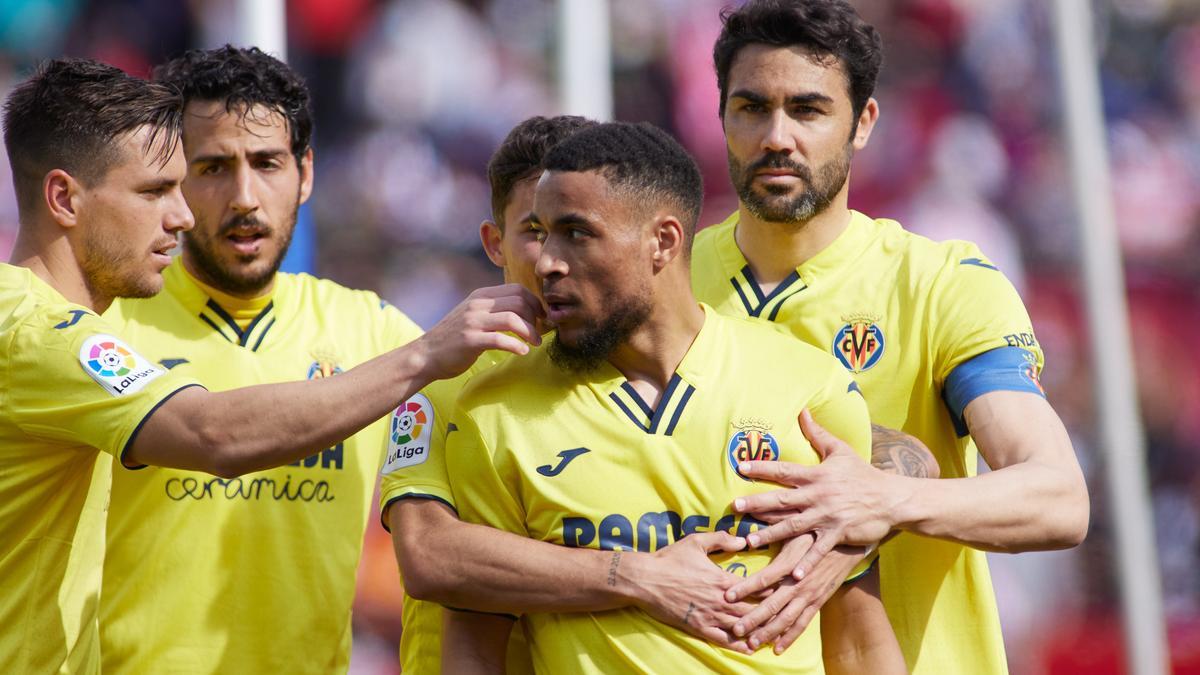 Villarreal players celebrate one of their team's goals. Villarreal players celebrate one of their team's goals.