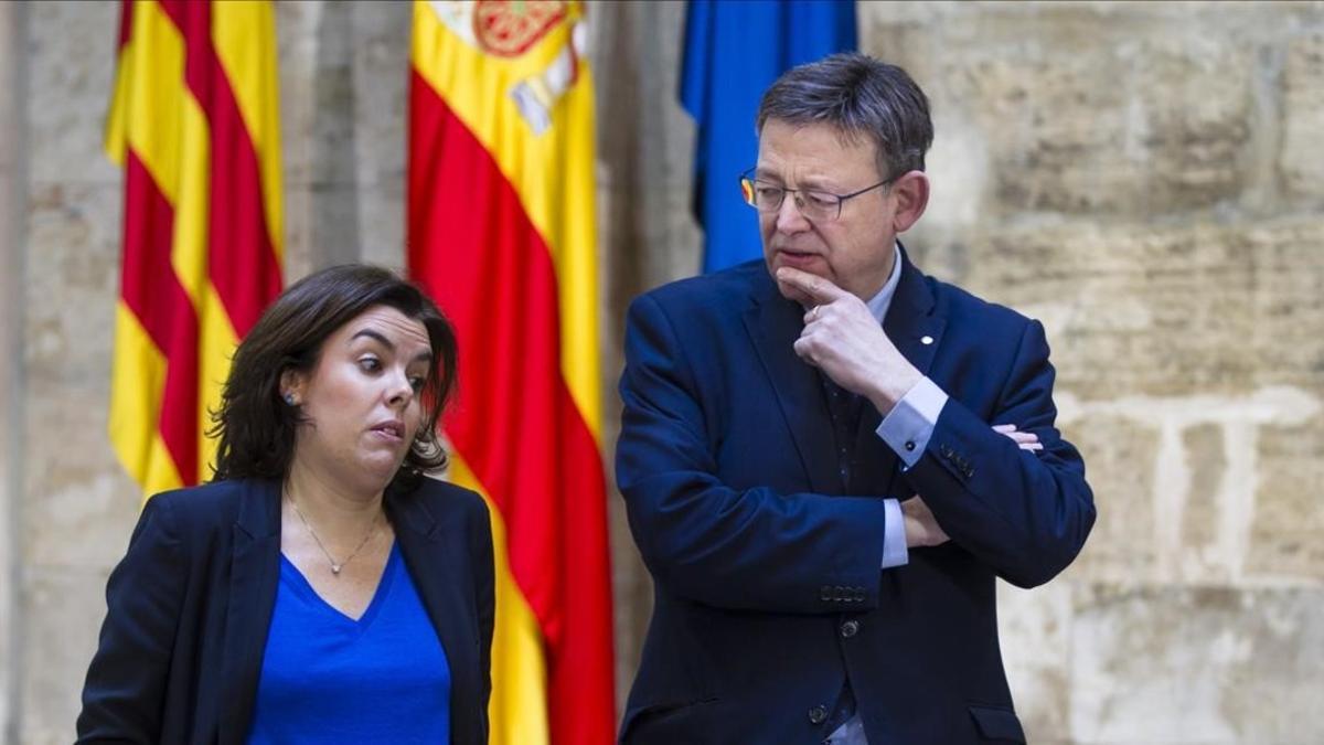 La vicepresidenta del Gobierno, Soraya Sáenz de Santamaría, y el presidente de la Generalitat Valenciana, Ximp Puig, este martes, 31 de enero, en València.