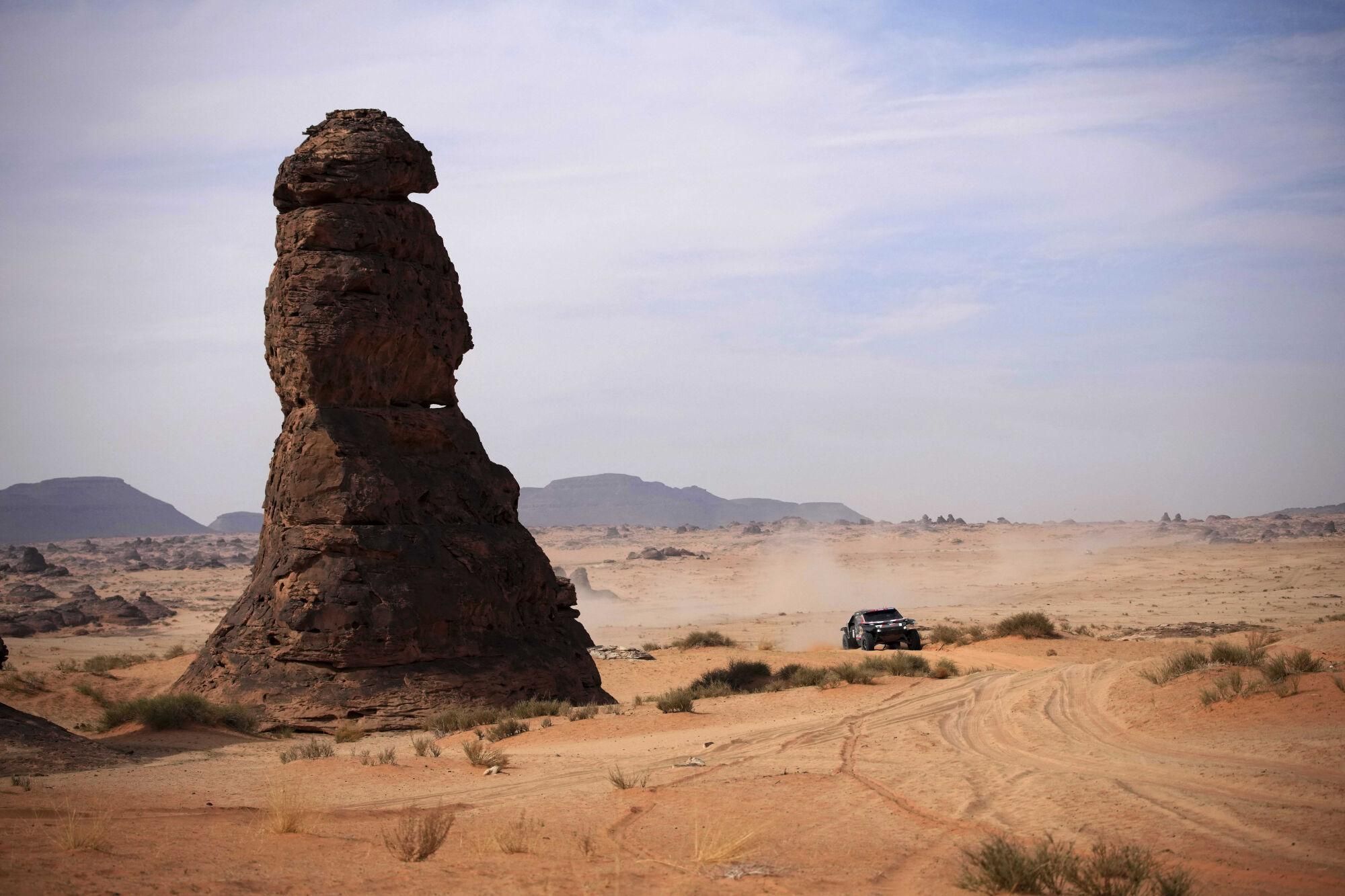 Driver Nasser Al-Attiya, and co-driver Edouard Boulanger drive their Daccia during the fifth stage of the Dakar Rally between Alula and Hail, Saudi Arabia, Thursday, Jan. 9, 2025. (AP Photo/Christophe Ena). EDITORIAL USE ONLY / ONLY ITALY AND SPAIN