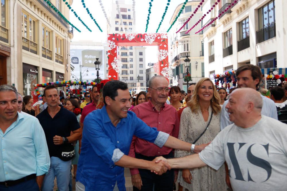 Paseo de Feria de Juanma Moreno por la calle Larios