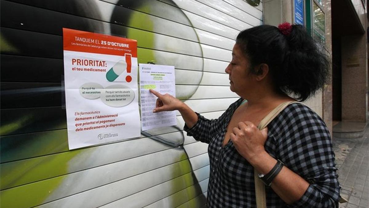 Farnacia de Barcelona cerrada durante la huelga de farmacias el 25 de octubre del 2012