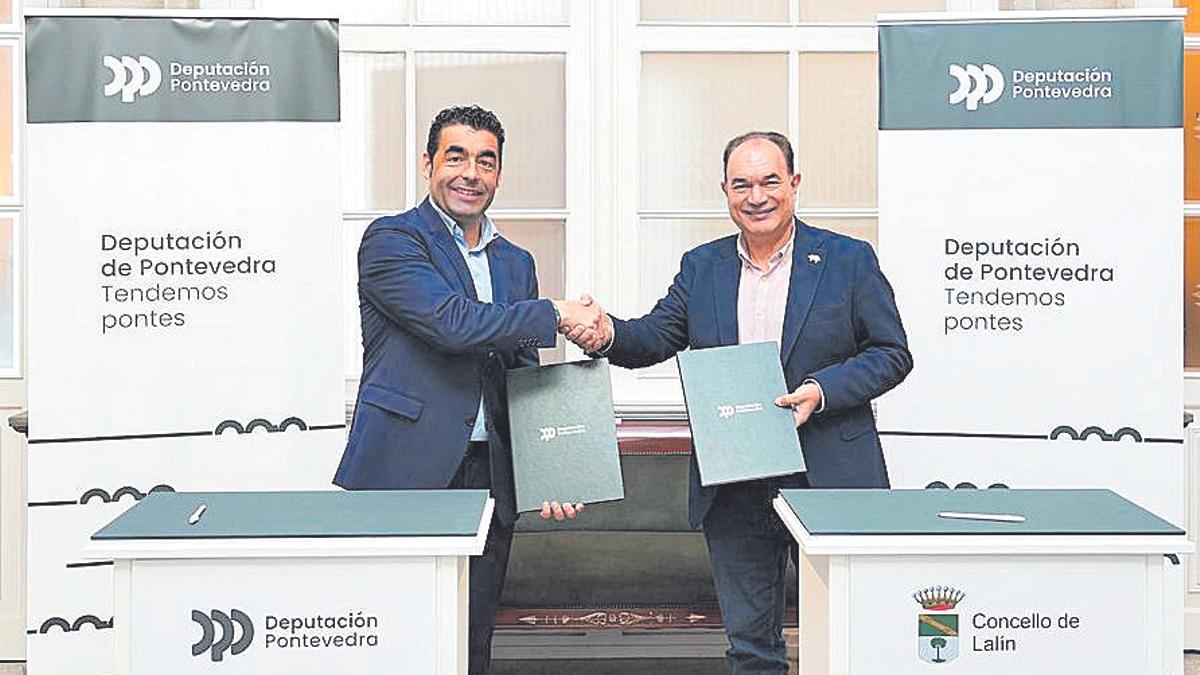 López y Crespo, durante la firma del convenio.