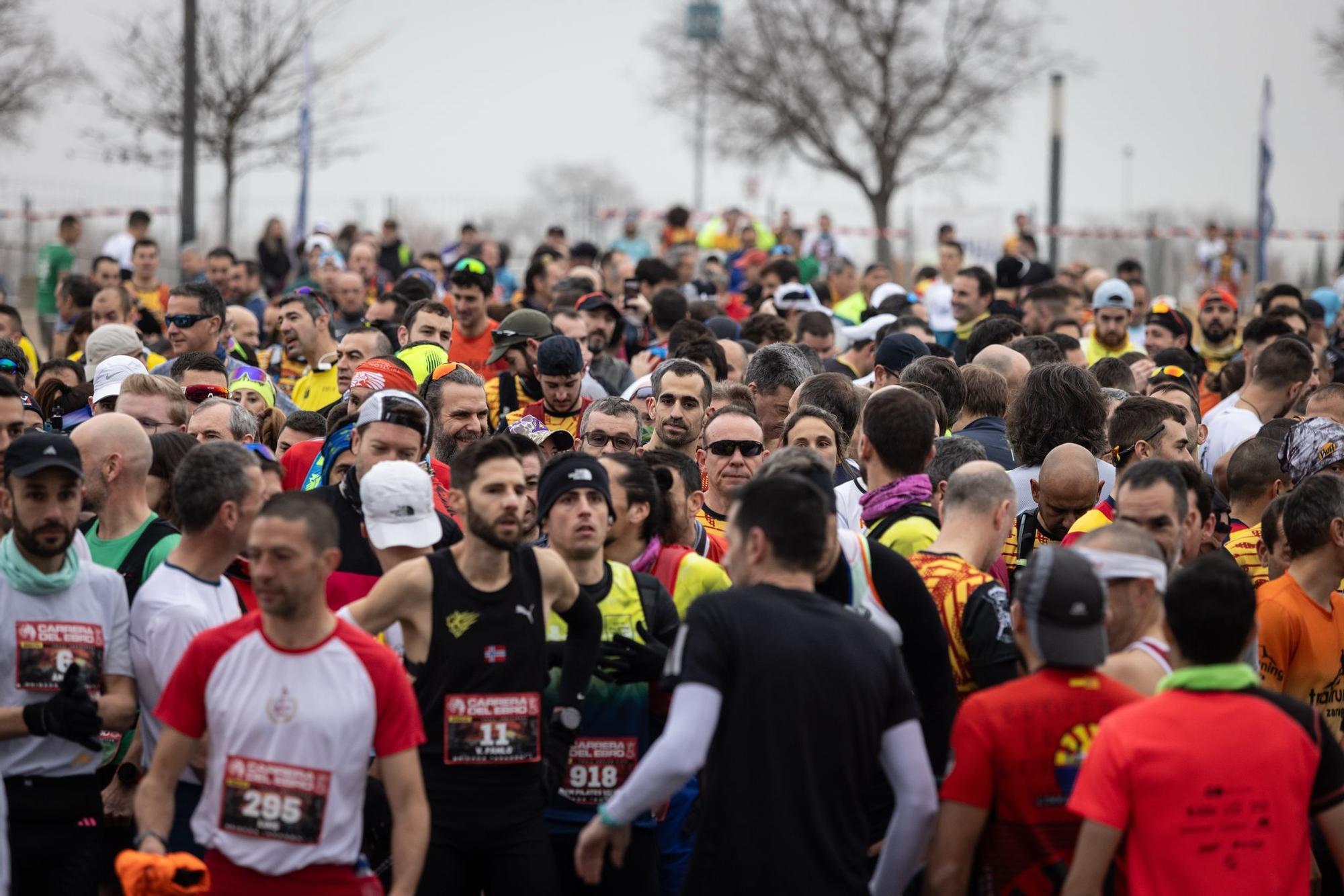 En imágenes | Más de 3.700 participantes se dan cita en la Carrera del Ebro de Zaragoza