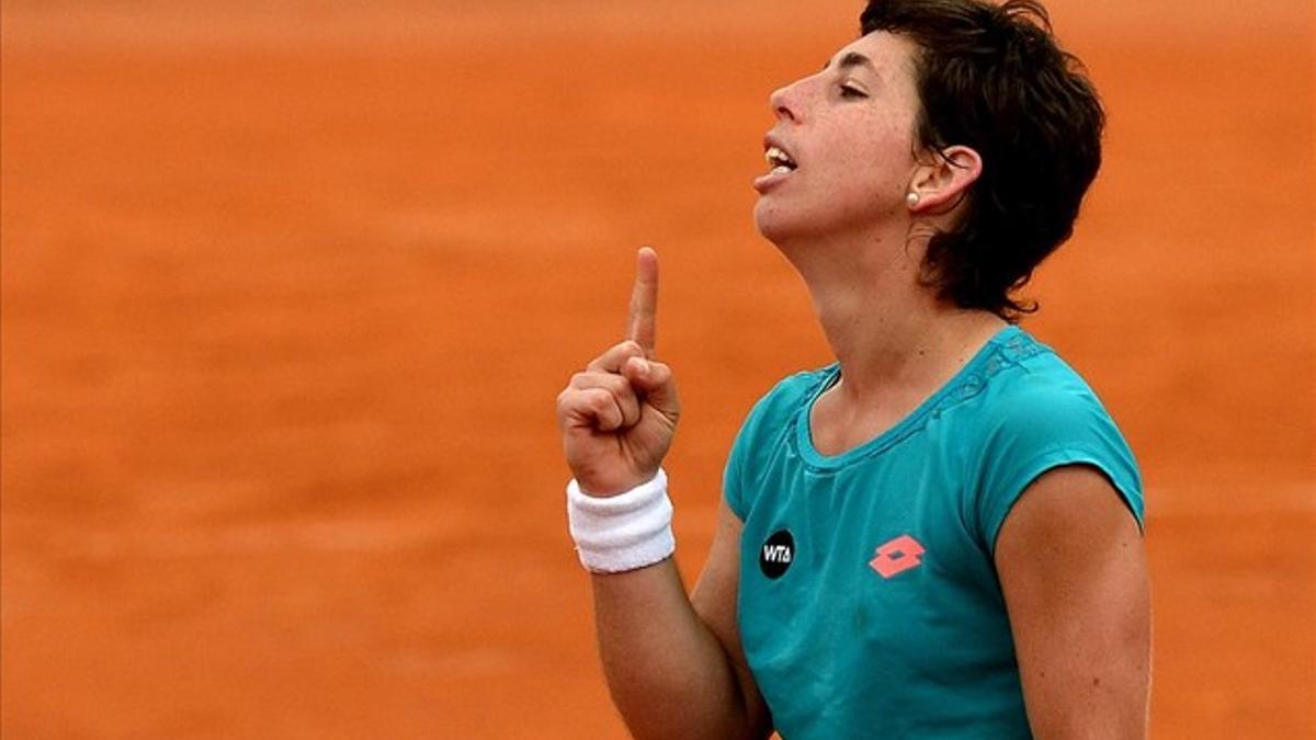 Carla Suárez celebra una victoria en el torneo de Roma.