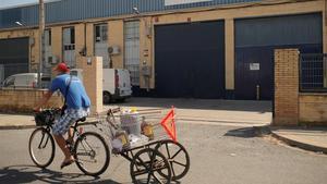 zentauroepp49520289 a man rides a bicycle past the closed magrudis factory in se190822233905