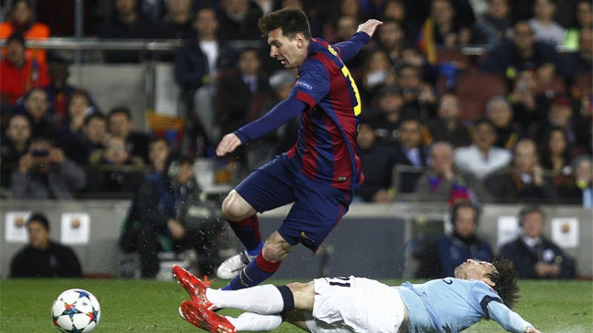 Leo Messi, con David Silva en el Barça-Manchester City de la Champions 2014-15