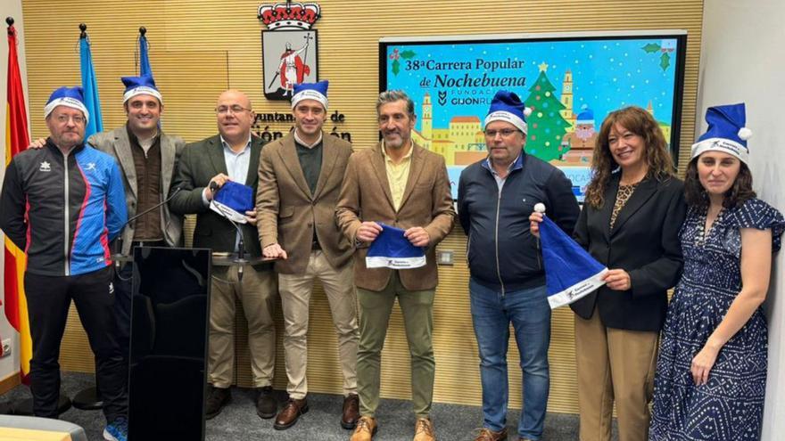 Organizadores y patrocinadores de la Carrera de Nochebuena. |