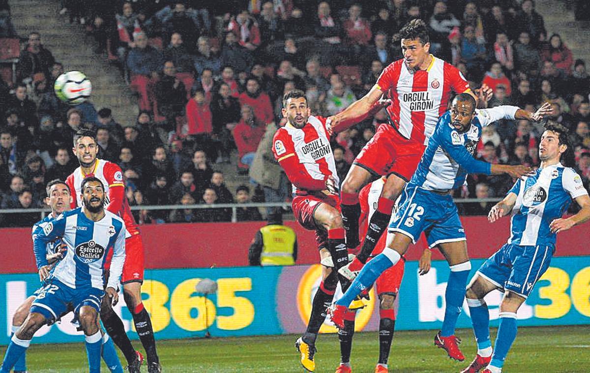 Bernardo Espinosa, Stuani i Juanpe, en un partit contra el Deportivo de l'any 2017-18