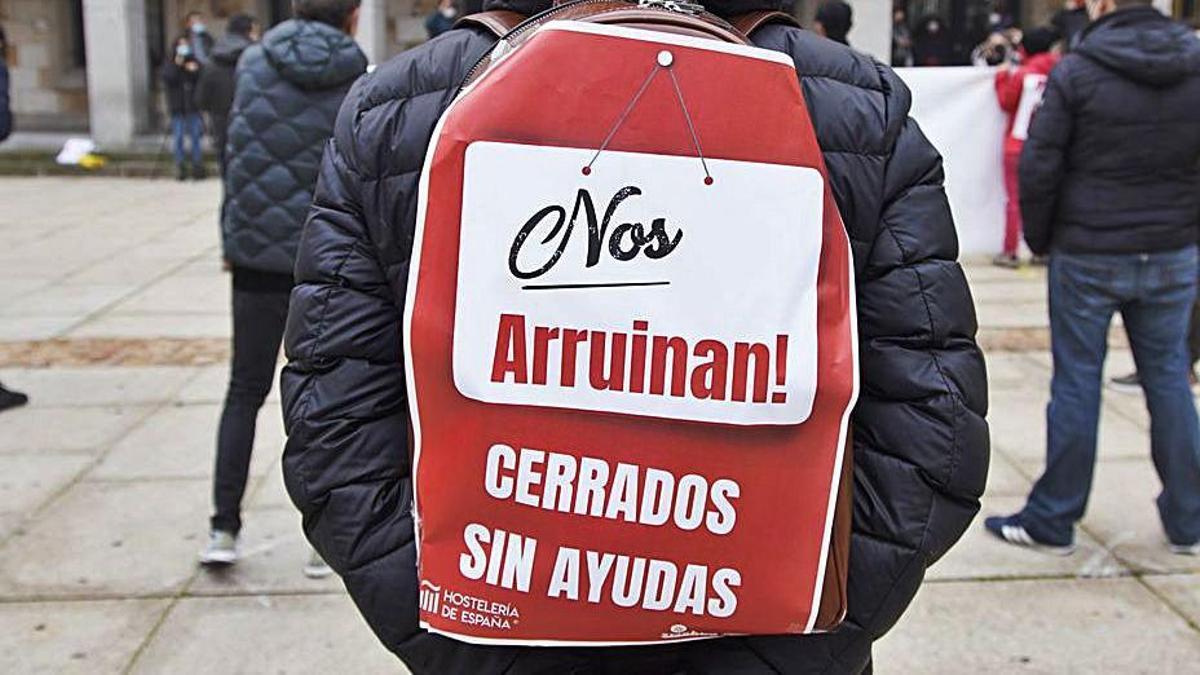 Pancarta de uno de los manifestantes. | Jose Luis Fernández