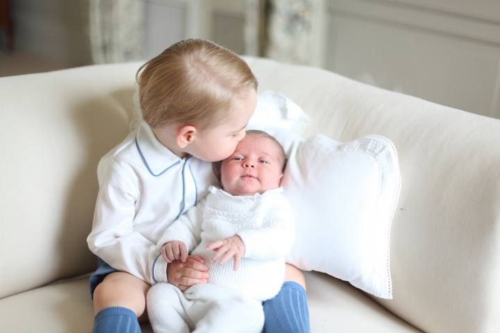 Prince George and Princess Charlotte are seen in this undated handout photo