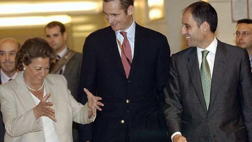 Rita Barberá, Iñaki Urdangarin y Francisco Camps, en una imagen de 2004.