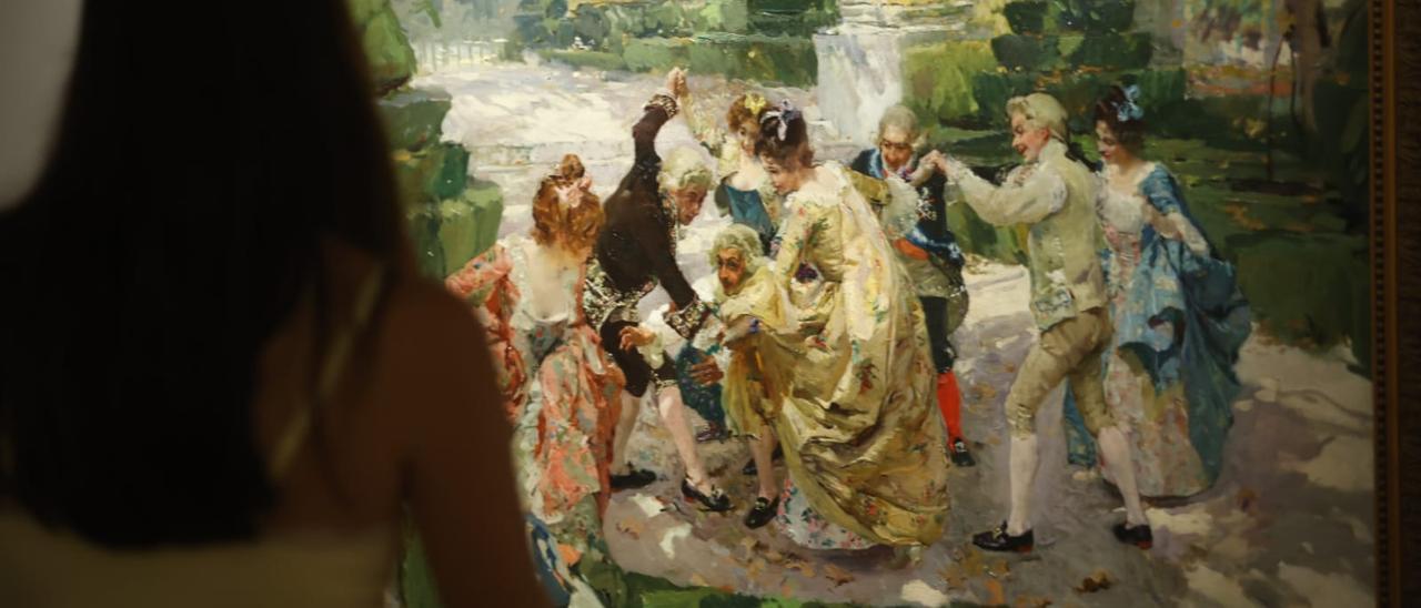 'Figuras de casacas jugando en un jardín'.