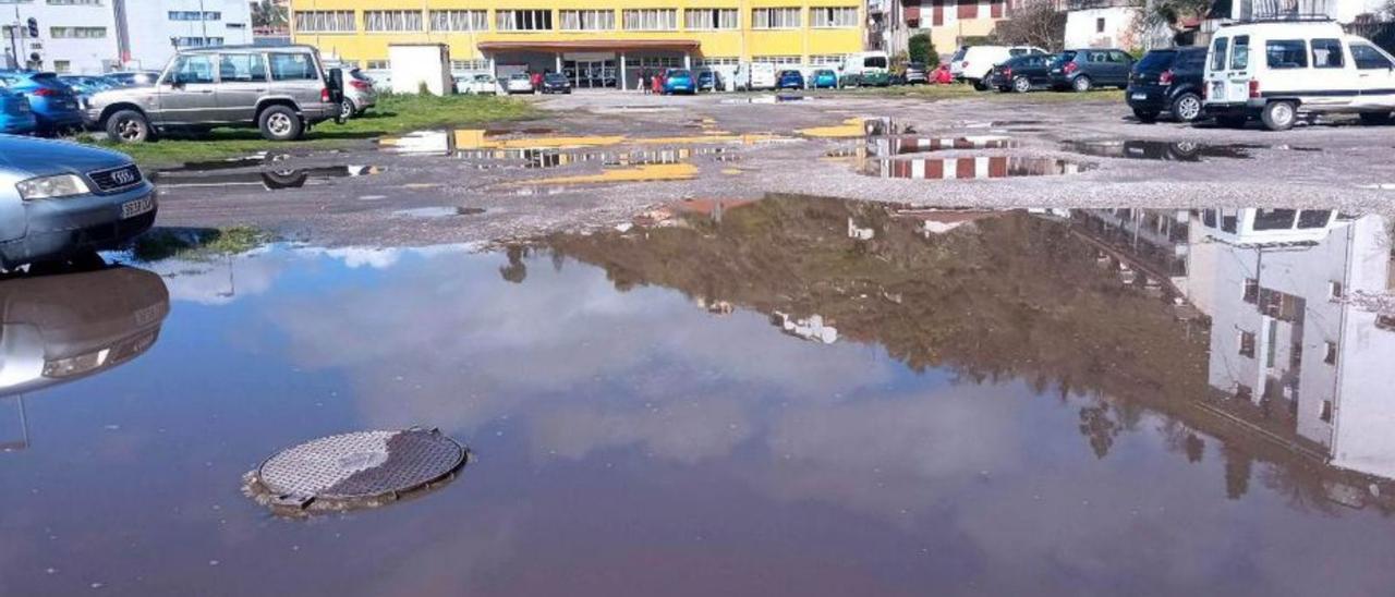 La parcela, con los charcos que se forman con la lluvia. | L. Camporro