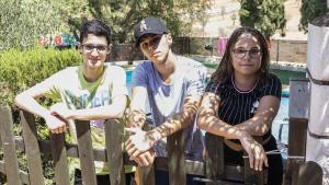 Miguel, Sheila y Neil han participado en campamentos de verano de Save the Children.