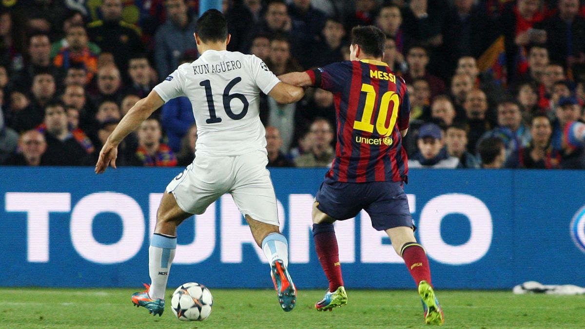 Leo Messi y Sergio Agüero en un partido de Champions League entre el Manchester City y el FC Barcelona