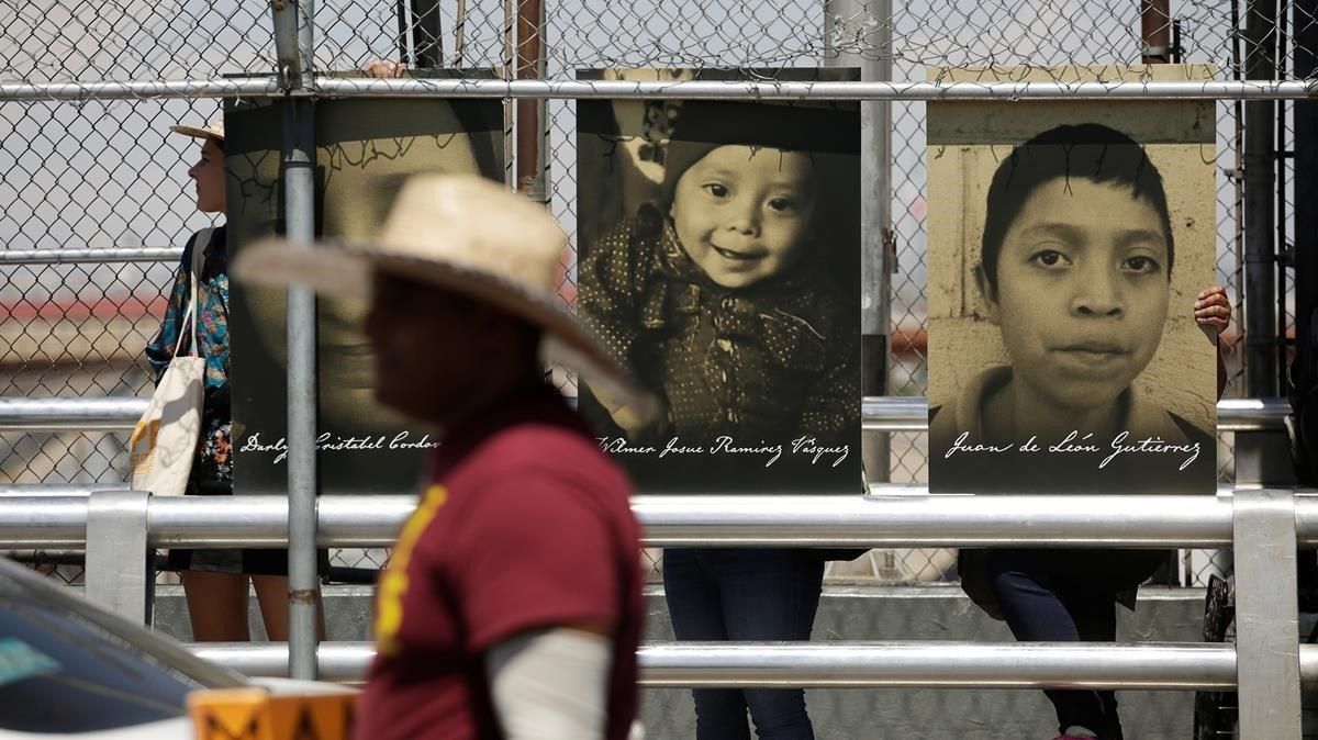 ealos48845459 activists hold photos of migrant children that die in u s  c190630145723