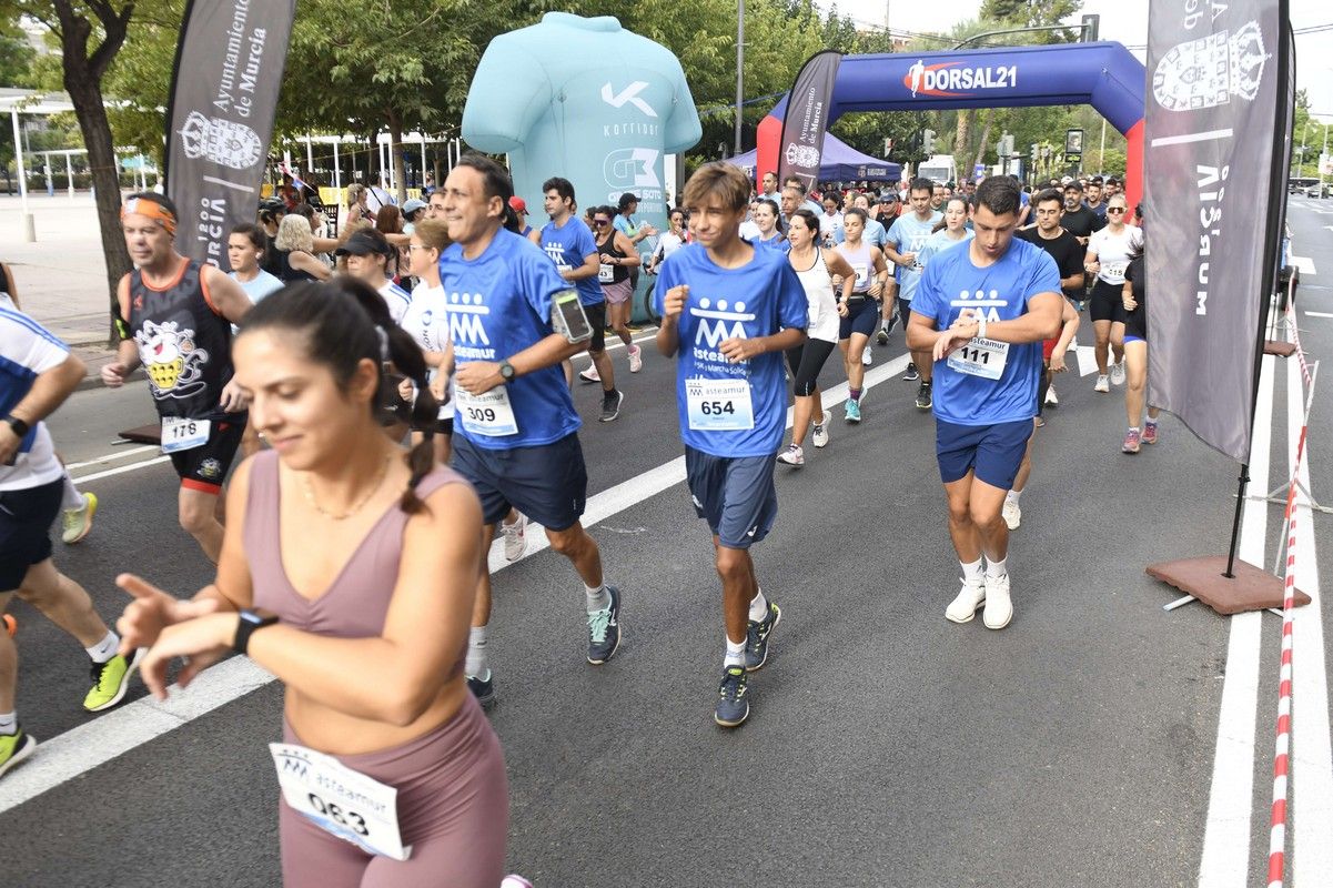 La carrera y marcha Solidaria Asteamur, en imágenes