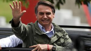 Jair Bolsonaro  far-right lawmaker and presidential candidate of the Social Liberal Party  PSL   gestures at a polling station in Rio de Janeiro  Brazil October 28  2018  REUTERS Pilar Olivares      TPX IMAGES OF THE DAY