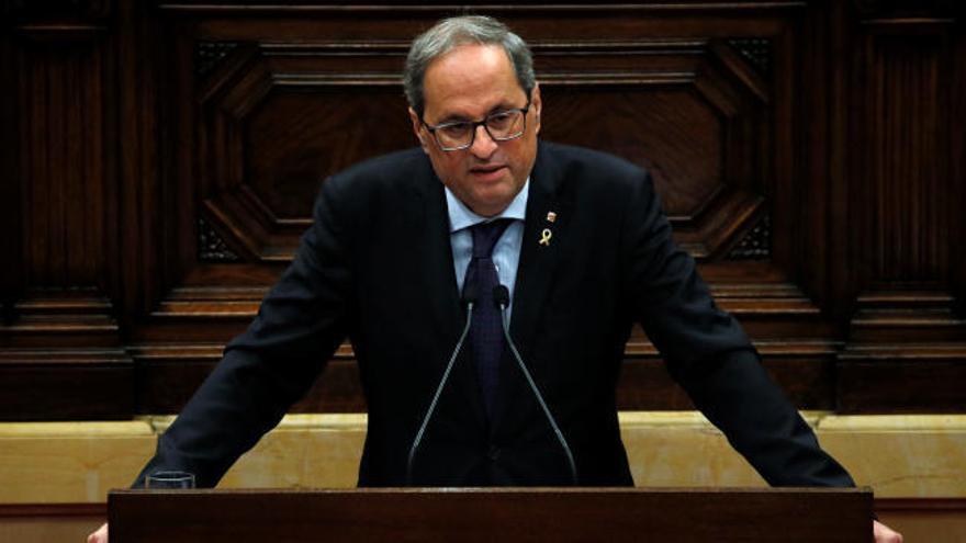 Torra se compromete a volver a poner urnas