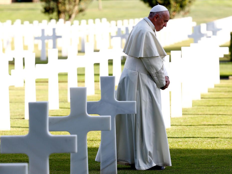 Pope Francis prays before a Mass at the U.S.