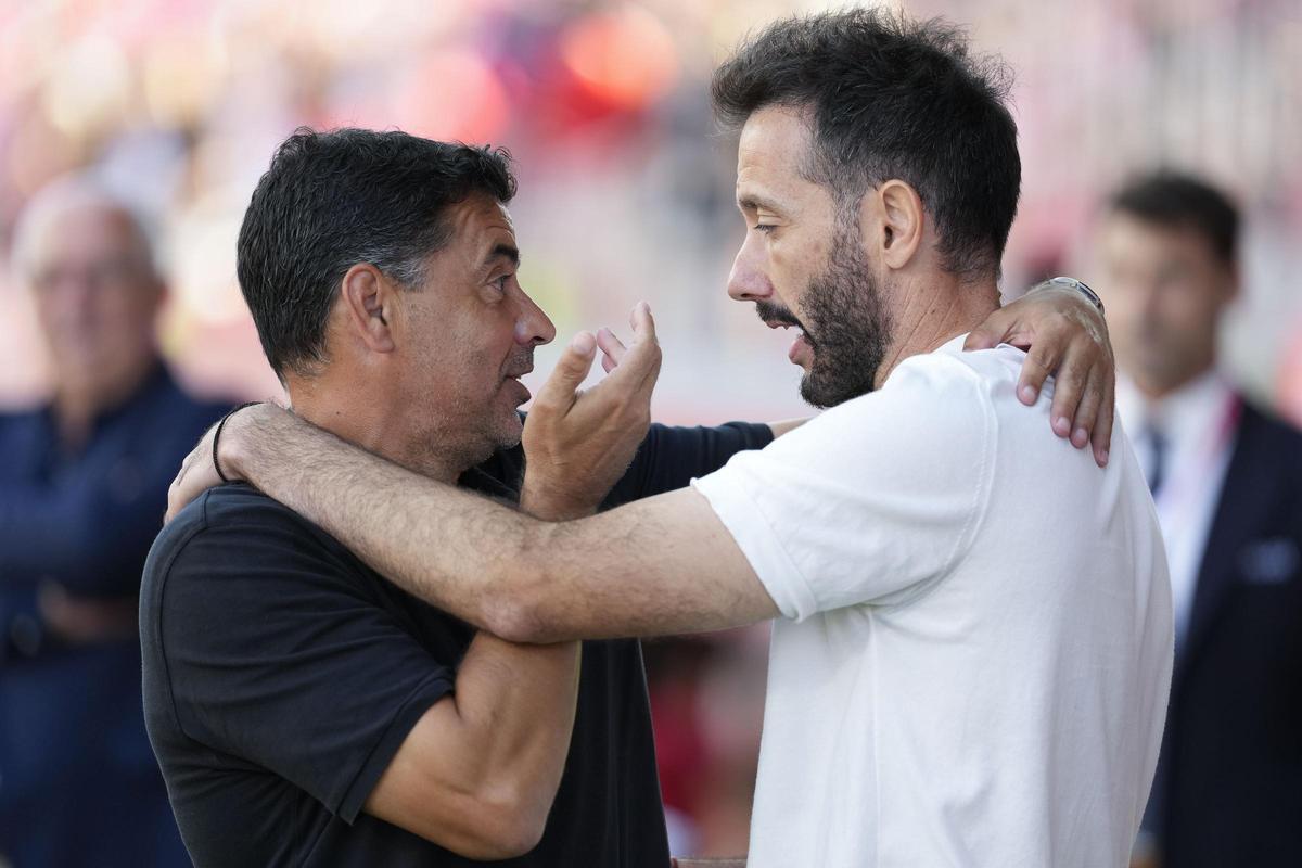 Míchel i Carlos Corberán, en el partit de la primera volta.