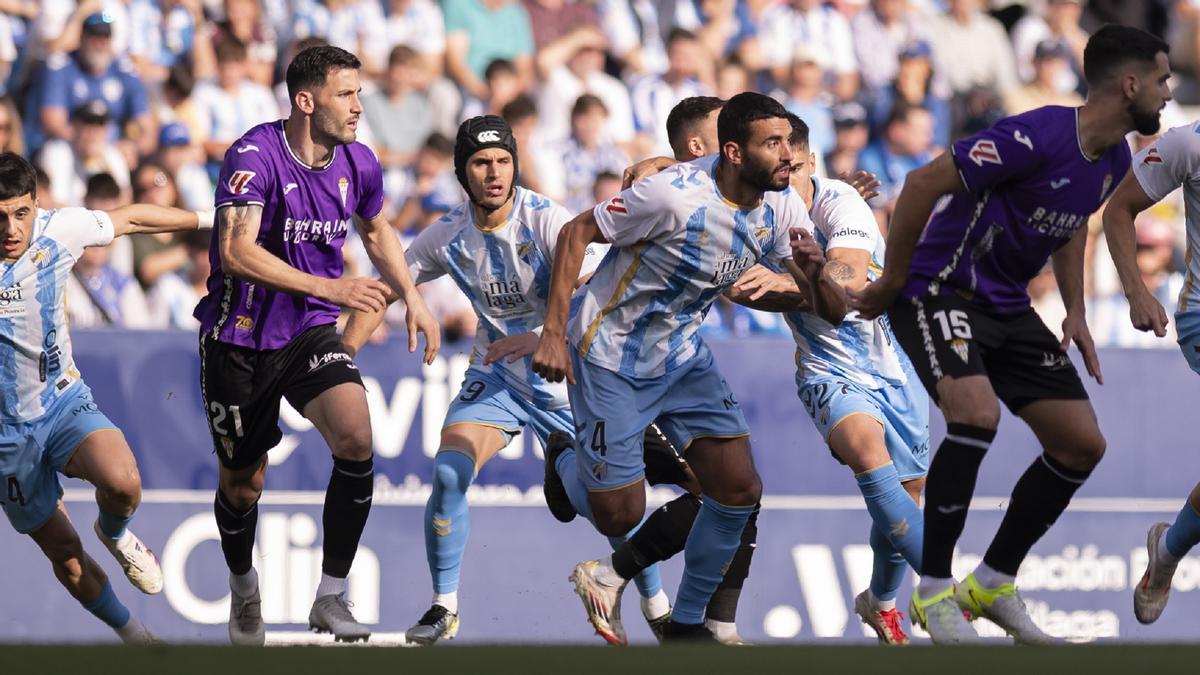 Luismi y Einar Galilea, ante el Córdoba en La Rosaleda.